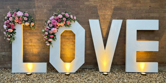 4ft LOVE letters with Artificial Floral Swag Decor & warm lighting optional floral colour schemes available