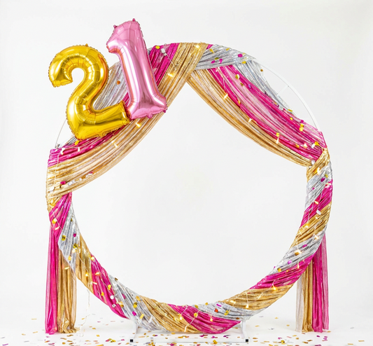 White Circular Metal Backdrop Frame with your choice of theme decor hire